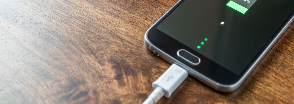 Mobile smartphone charging battery close-up