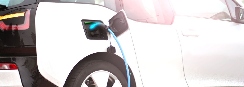 Electric car charging with a charger socket